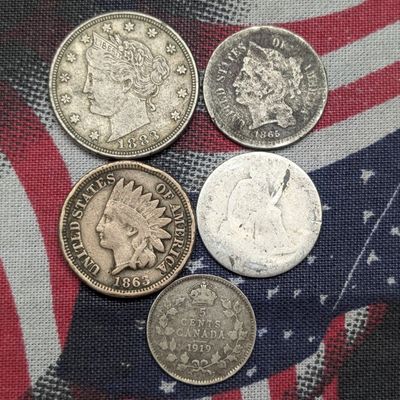 Sale Photo Thumbnail #279: 1863 Indian Head Cent, 1865 Three Cent Nickel, 1883 Liberty Head V Nickel, 1919 Canada 5 Cent, & No Date Seated Liberty Dime