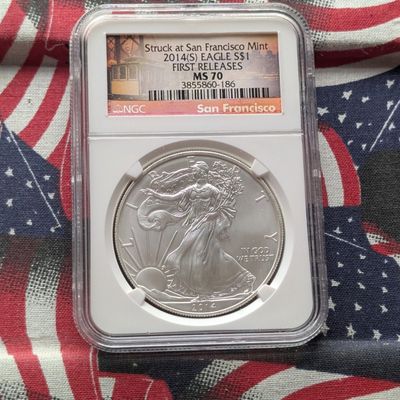 Sale Photo Thumbnail #75: 2014-(S) American Silver Eagle 1 Troy Oz. .999 Silver NGC MS70 First Release