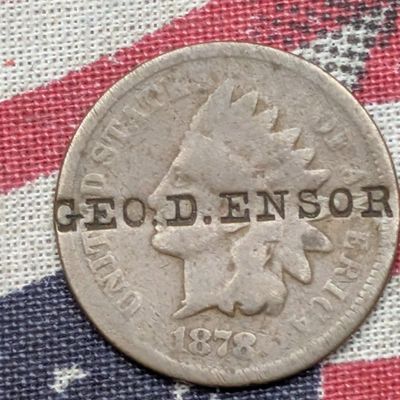 Sale Photo Thumbnail #110: 1878 Indian Head Cent, Counterstamped "GEO. D. ENSOR"