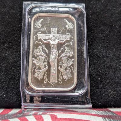 Sale Photo Thumbnail #338: 1 Troy Ounce .999 FINE SILVER Jesus on the Cross Designed Art Bar in Sealed Plastic