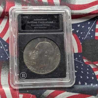 Sale Photo Thumbnail #35: 1976-D Eisenhower Bicentennial Dollar - Slabbed Authentic BU