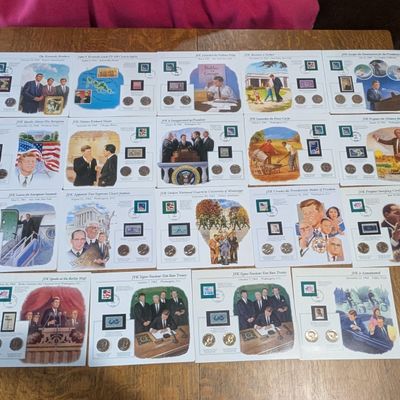 Sale Photo Thumbnail #413: (19) Assorted Kennedy Half Dollars & Commem Stamps in Info Display Cards - Each Display Has 2 Coins
