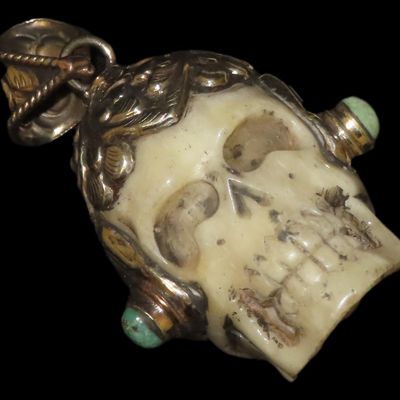 Sale Photo Thumbnail #355: 2 1/4" Tribal Skull with Turquoise Stones