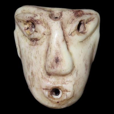 Sale Photo Thumbnail #295: 1 1/8" Eskimo / Inuit Bone Maskette, Alaska