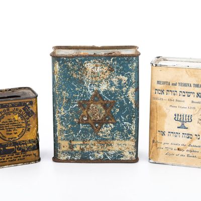 THREE TIN CHARITY CONTAINERS.