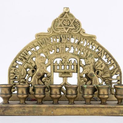 A BRASS HANUKKAH LAMP. Probably USA, early 20th century.