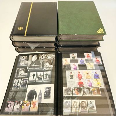 A LARGE MINT WORLD STAMP COLLECTION: CELBRITIES, SPORTS AND ROYAL FIGURES, HISTORY
