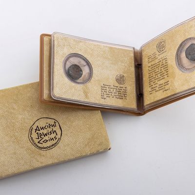 A COLLECTION OF FOUR ANCIENT JEWISH COINS IN THE ORIGINAL HOLDER