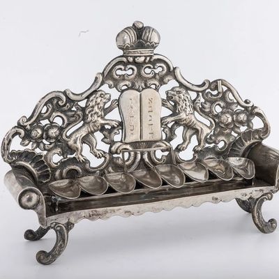 A SOFA SHAPED SILVER HANUKKAH LAMP. Vienna, Austria, 1842.