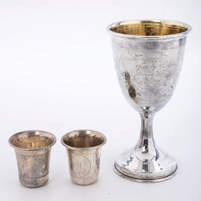 THREE STERLING SILVER KIDDUSH CUPS. American, c. 1900.