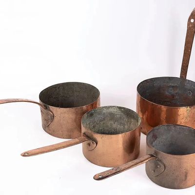 A COLLECTION OF 4 COPPER HAND WROUGHT POTS. Mostly Russian, 19th and early 20th centuries. Dovetail