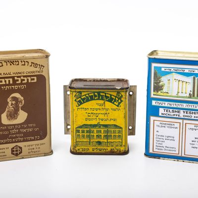 A COLLECTION OF THREE CHARITY CONTAINERS
