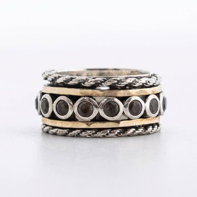 A 14K AND STERLING SILVER RING. Israel, modern