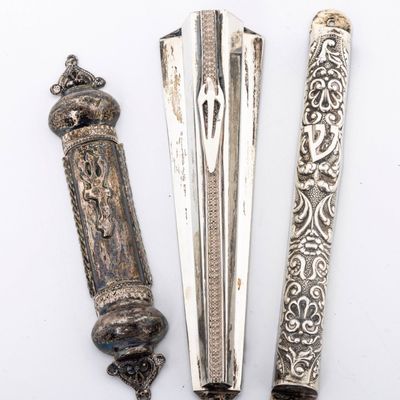 A GROUP OF THREE STERLING SILVER MEZUZOT. Israel, modern.
