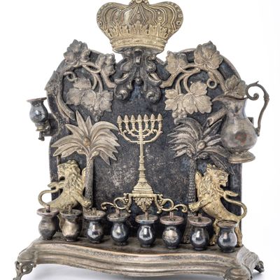A BRASS HANUKKAH LAMP. Warsaw, c. 1880.