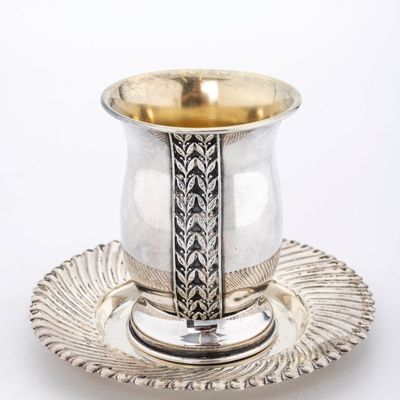 A STERLING SILV ER KIDDUSH CUP WITH UNDERPLATE. PROBABLY Israel, c. 2000.