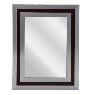 FRENCH METAL FRAMED MIRROR IN THE MANNER OF JANSEN C 1970.