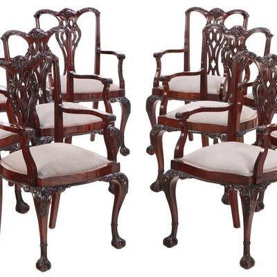 Sale Photo Thumbnail #250: RARE SET OF TWELVE ENGLISH MAHOGANY CHIPPENDALE ARM CHAIRS C 1900.