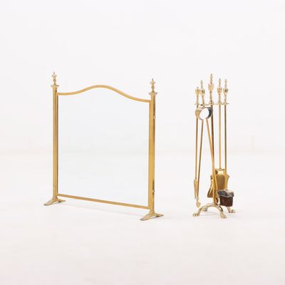 Sale Photo Thumbnail #204: BRASS AND GLASS FIRESCREEN WITH MATCHING TOOLS C 1970.