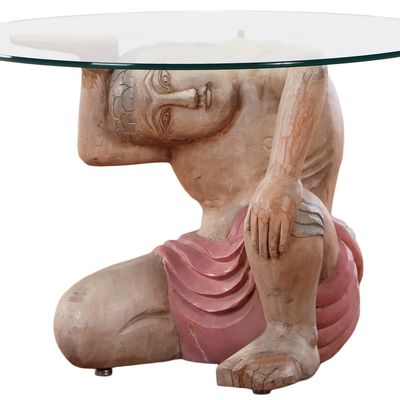 Sale Photo Thumbnail #198: PAINTED AND CARVED WOOD  COFFEE TABLE HAVING AN EGYPTIAN FIGURE SUPPORTING A GLASS TOP.