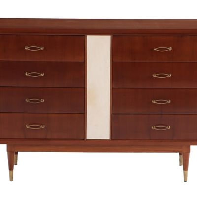 EIGHT DRAWER WALNUT DRESSER HAVING PARCHMENT PANEL AND ELEGANT BRASS HARDWARE C 1960.
