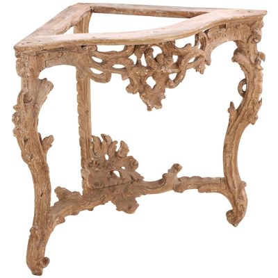 Sale Photo Thumbnail #200: CONTINENTAL CARVED AND GILTWOOD CORNER CONSOLE TABLE C 1890. LACKING TOP.