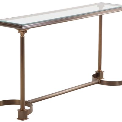 Sale Photo Thumbnail #155: A BRASS AND IRON CONSOLE TABLE HAVING CORINTHIAN CAPITALS AND A BEVELED GLASS TOP C 1970.