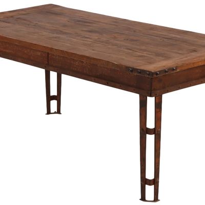 Sale Photo Thumbnail #330: IRON TABLE BASE HAVING OPEN WORK LEGS SUPPORTING A PINE TOP WITH IRON MOUNTS ON THE CORNERS C 1900.