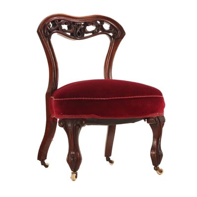 Sale Photo Thumbnail #257: NINETEENTH CENTURY CARVED WALNUT BOUDOIR CHAIR WITH PIERCED CARVED BACK.