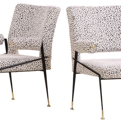 LARGE PAIR OF PAINTED IRON AND BRASS UPHOLSTERED ARM CHAIRS IN THE MANNER OF JULES LELEU.