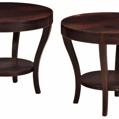 PAIR ROUND LEATHER END TABLES HAVING THE TEXTURE OF ALLIGATOR SKIN.