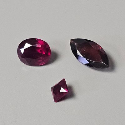 Three Loose Faceted Garnet Gemstones