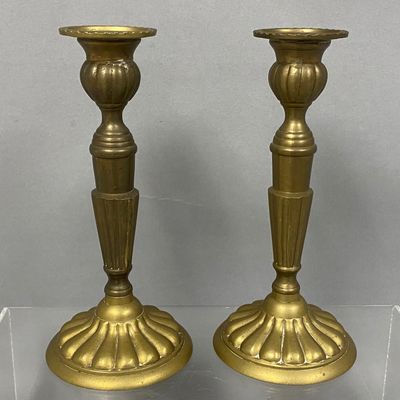 A Pair of Brass Candlesticks
