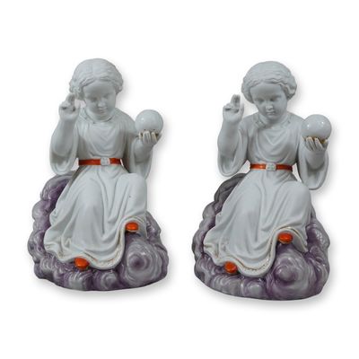 A Pair of Porcelain Figurines Depicting the Child Jesus as Salvator Mundi