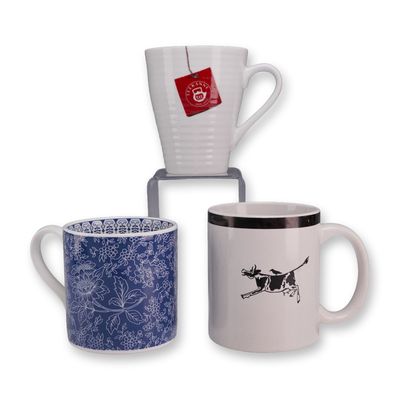 A Trio of Assorted Ceramic Mugs including Wedgwood