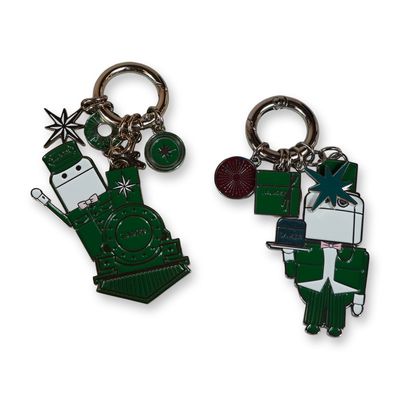 Pair of La Mer Holiday Train Enamel Keychains