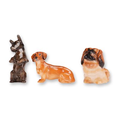 3pc Royal Doulton Dog Figurines, Pekinese, Dachshund, and Scottish Terrier