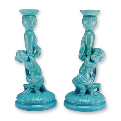A Pair of Wedgwood Turquoise Glazed Pearlware Cherub Candlesticks