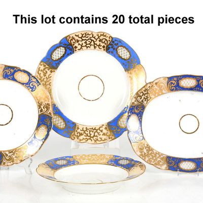 Sale Photo Thumbnail #331: Twenty Pieces of Blue and Parcel-Gilt Porcelain Plates, 19th/ 20th Century