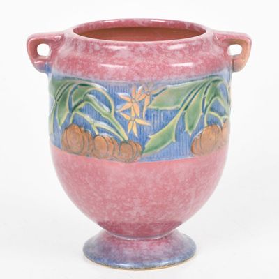 Sale Photo Thumbnail #393: A Roseville Pottery Pink "Baneda" Double-Handled Footed Vase, c. 1930
