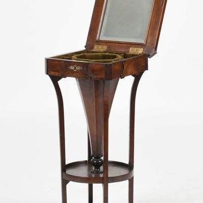 Sale Photo Thumbnail #137: A Continental Walnut and Mahogany Lift-Top Sewing Table, 19th Century