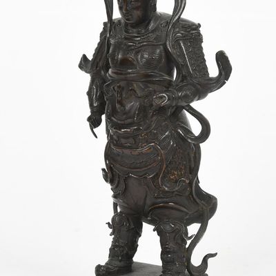 Sale Photo Thumbnail #188: A Chinese Patinated-Bronze Figure of a Warrior, Late Ming/ Early Qing Period