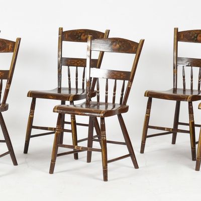 Sale Photo Thumbnail #366: A Set of Six Pennsylvania Painted and Stenciled Plank-Seat Side Chairs, Third Quarter 19th Century
