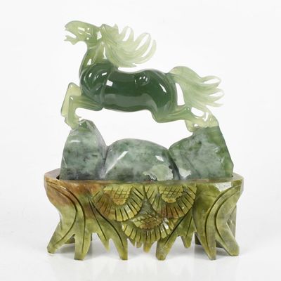 Sale Photo Thumbnail #184: A Chinese Jade Carving of a Horse