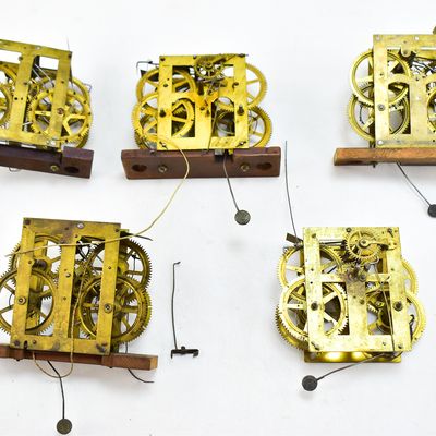 FIVE BRASS CLOCK MOVEMENTS