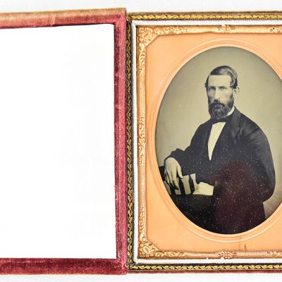 TINTYPE OF A MAN IN ARMCHAIR