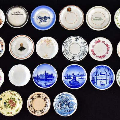 ASSORTMENT OF 21 CERAMIC BUTTER PATS
