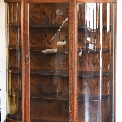 LATE VICTORIAN BOW-FRONT CURIO CABINET