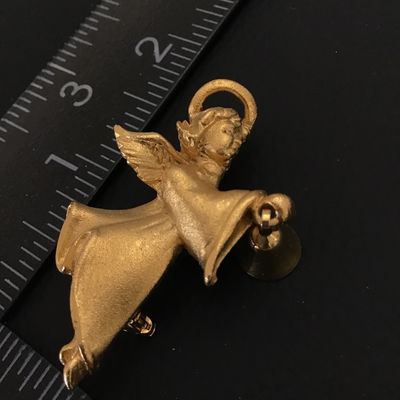 Gold tone angel brooch