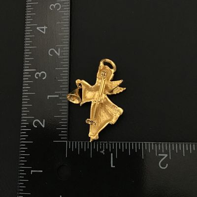 Gold tone angel brooch